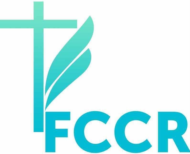 A logo for a church with a cross and a feather.