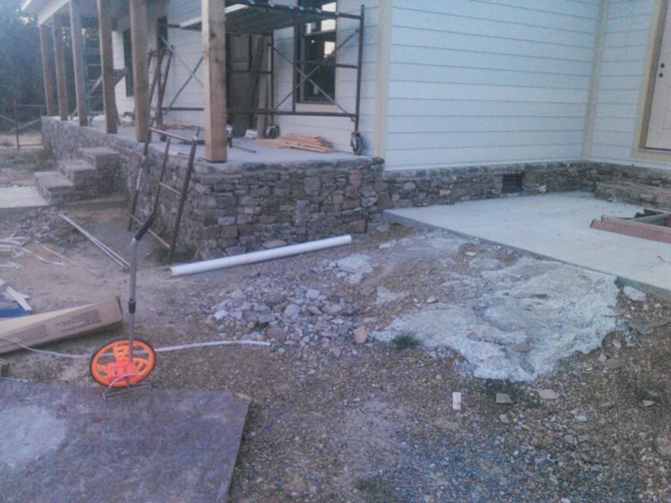A house that is being built with a scaffolding in the background