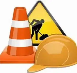 Orange traffic cone, yellow construction sign, and orange hard hat.