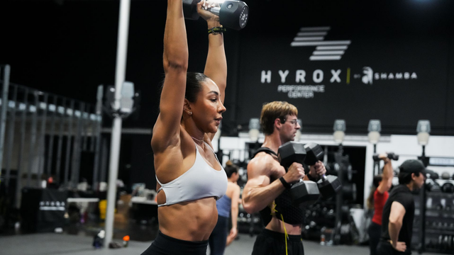 lifting weights at Shamba Vibe