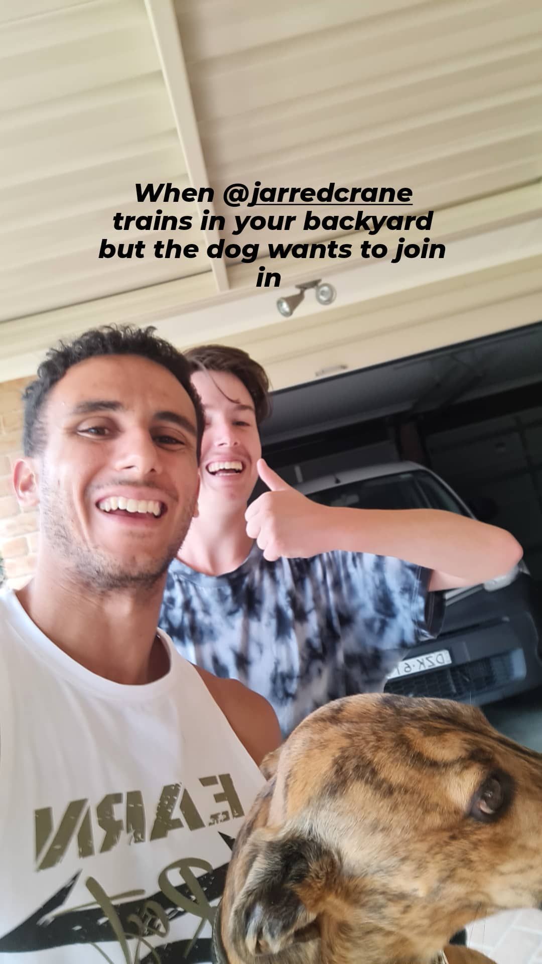 Two men and a dog smiling; one man giving a thumbs up —True Form Fitness In Gwandalan, NSW