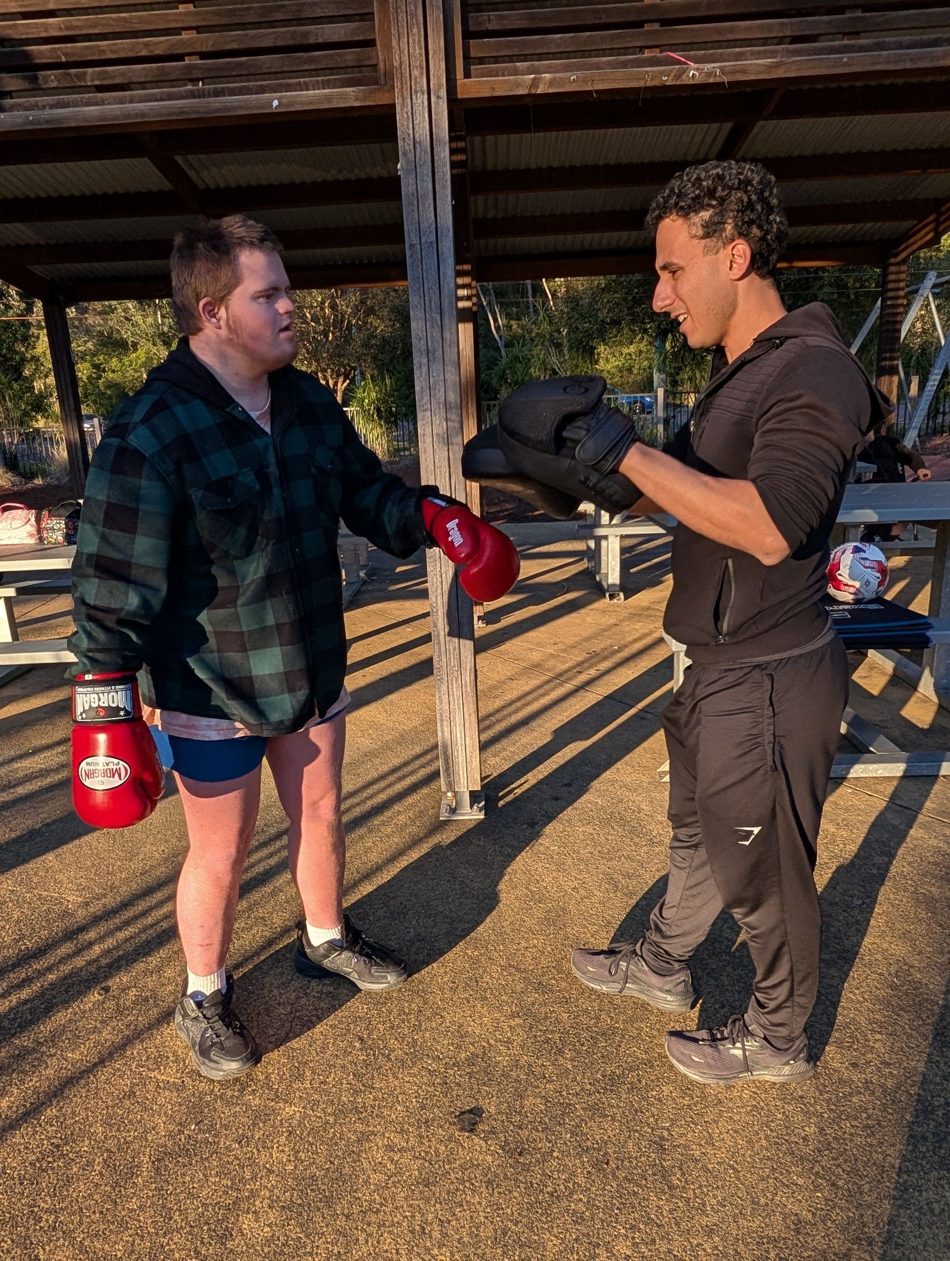 Two men boxing outdoors —True Form Fitness In Gwandalan, NSW