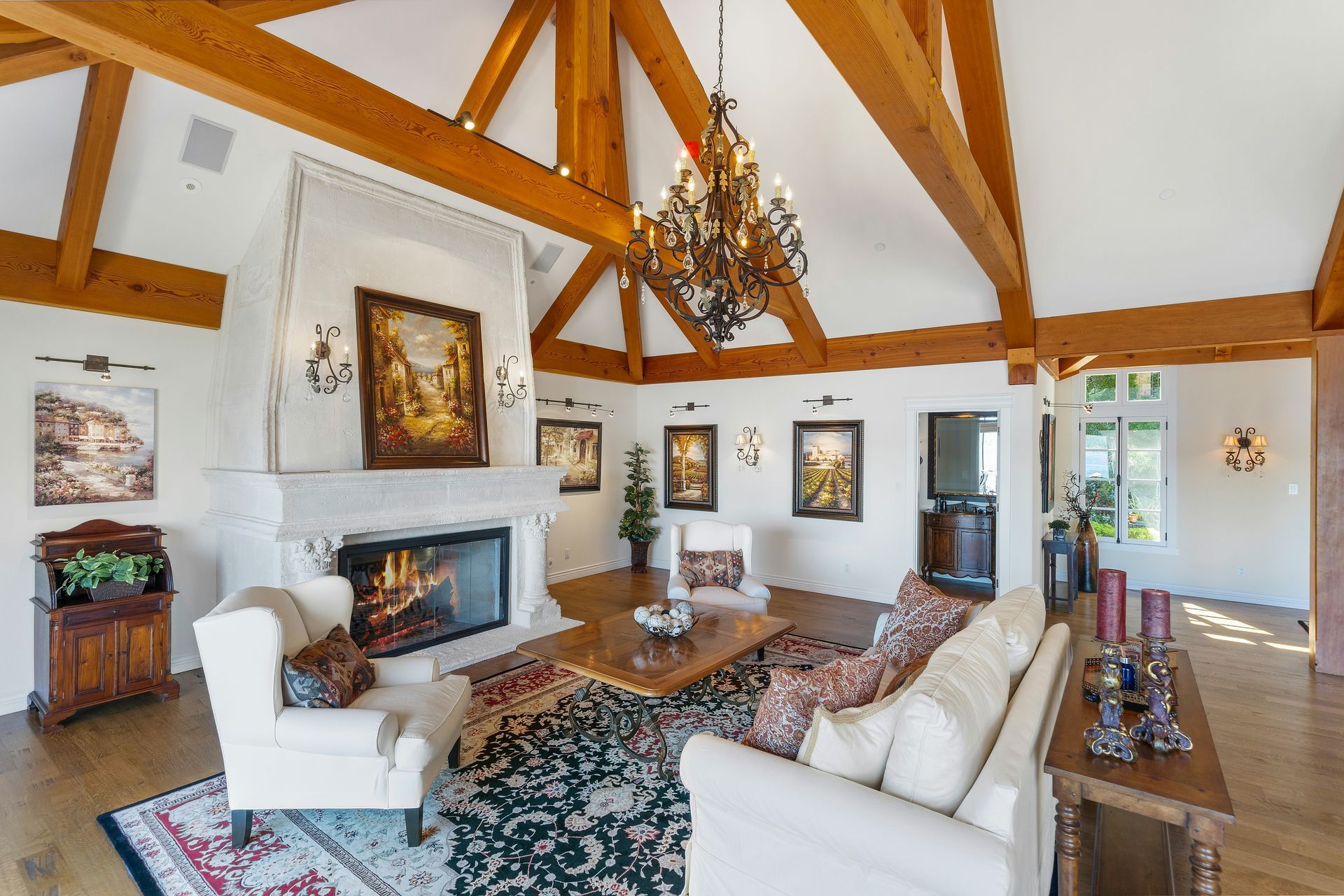A living room filled with furniture and a fireplace.
