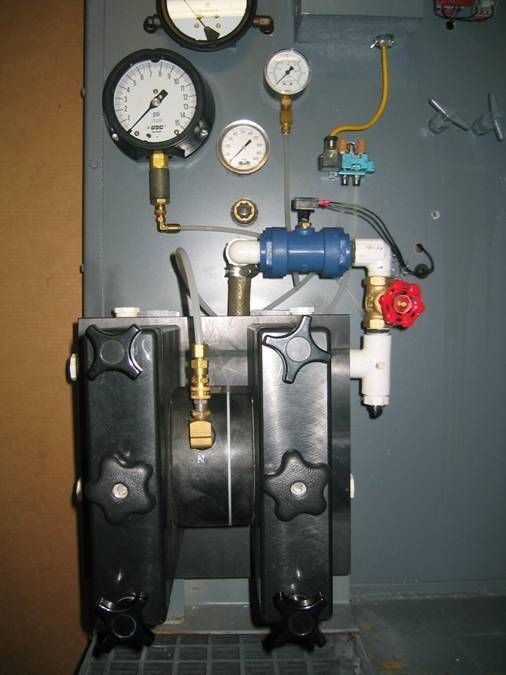 Quick Change Pump System installed in running position on test stand