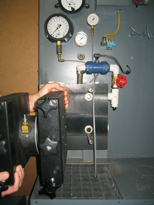 Step 4: Retrieve spare pump from assigned storage near machine (10 seconds)