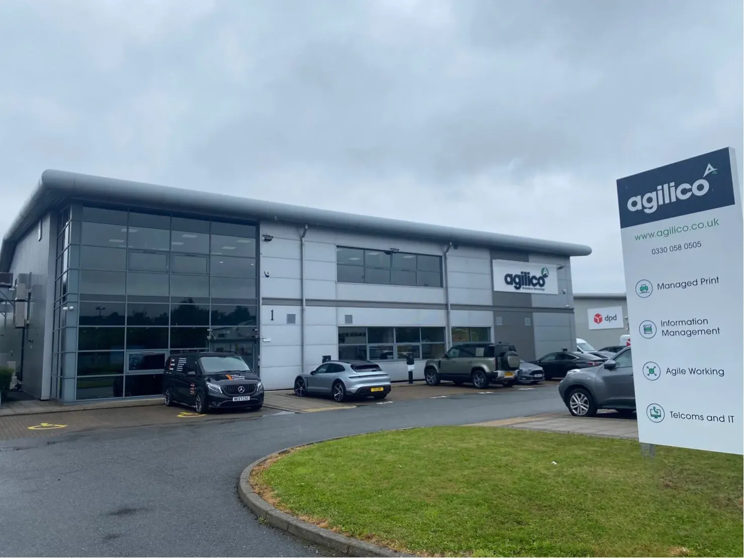 A gray building with the 