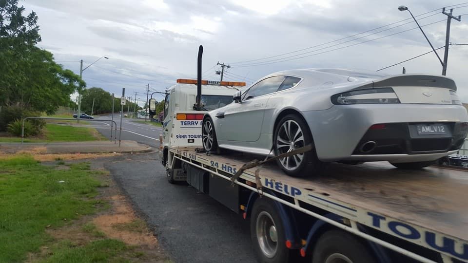 Tow Truck Loading A White Car - Roadside Assistance in Grafton, NSW