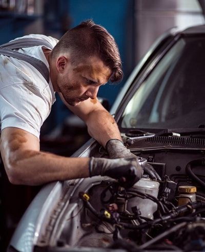 Mechanic Fixing a Car — Mechanical Servicing in Macquarie, NSW