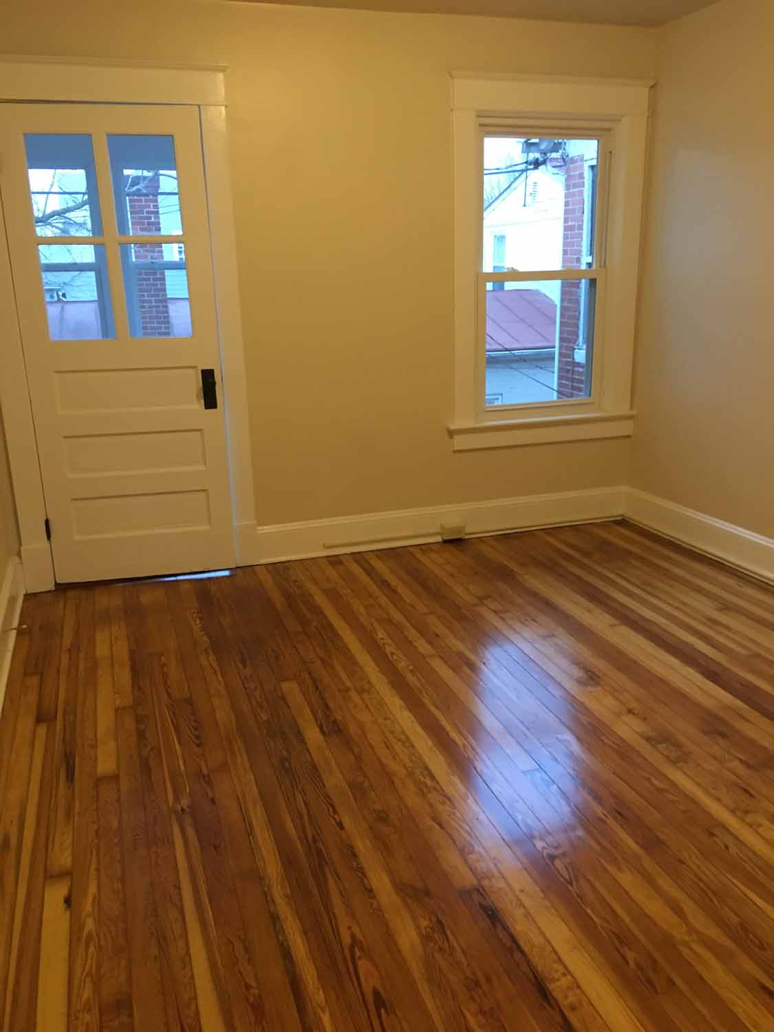 Room with hardwood flooring