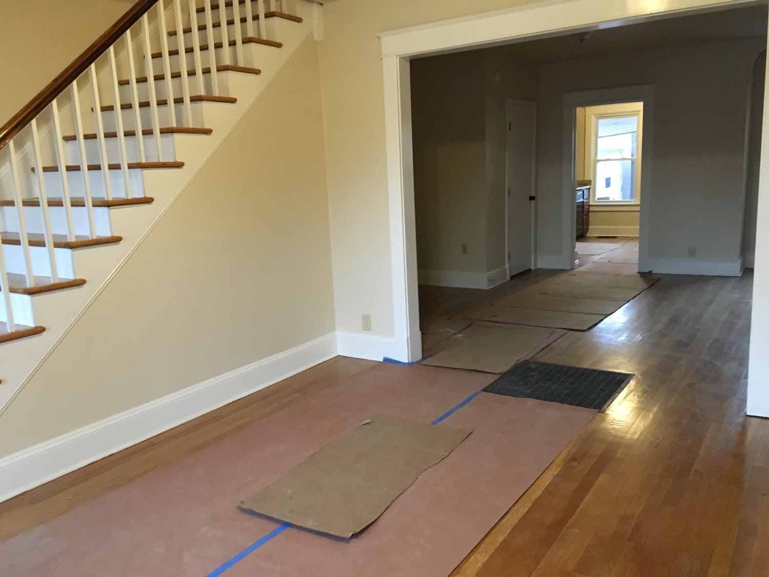 Walkway next to stairs in a house