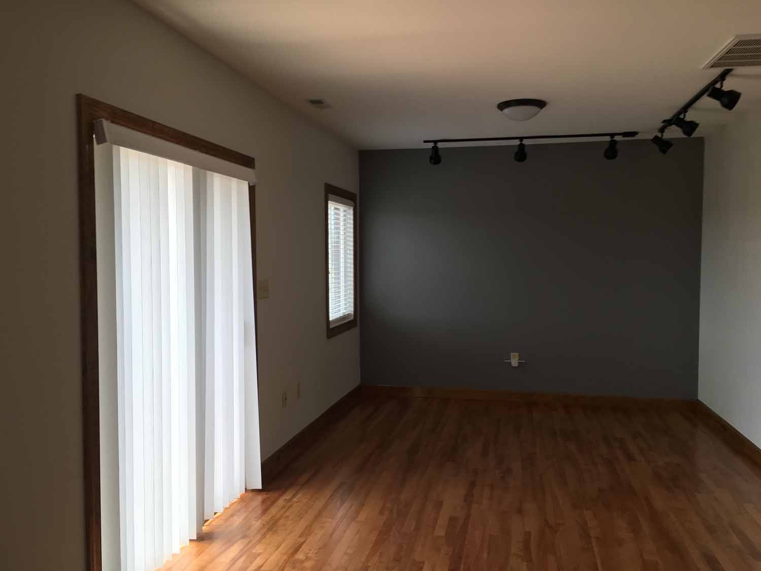Room with hardwood flooring