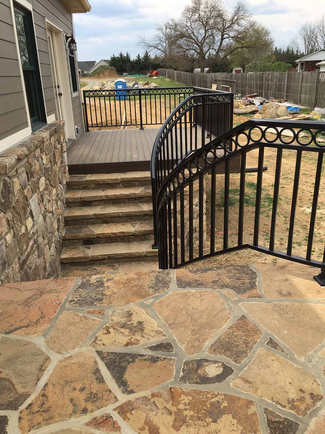 Wooden deck and stone patio