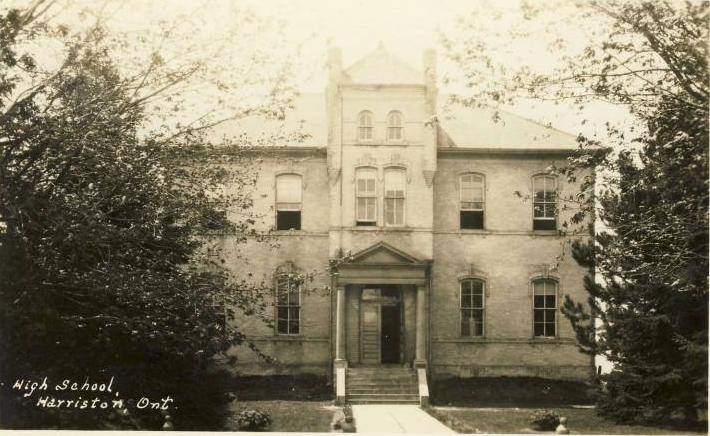 A black and white photo of a high school building