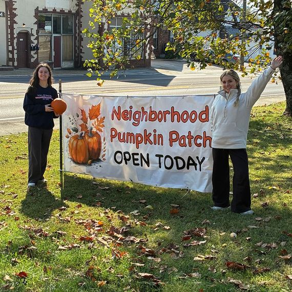 Two people stand near a 