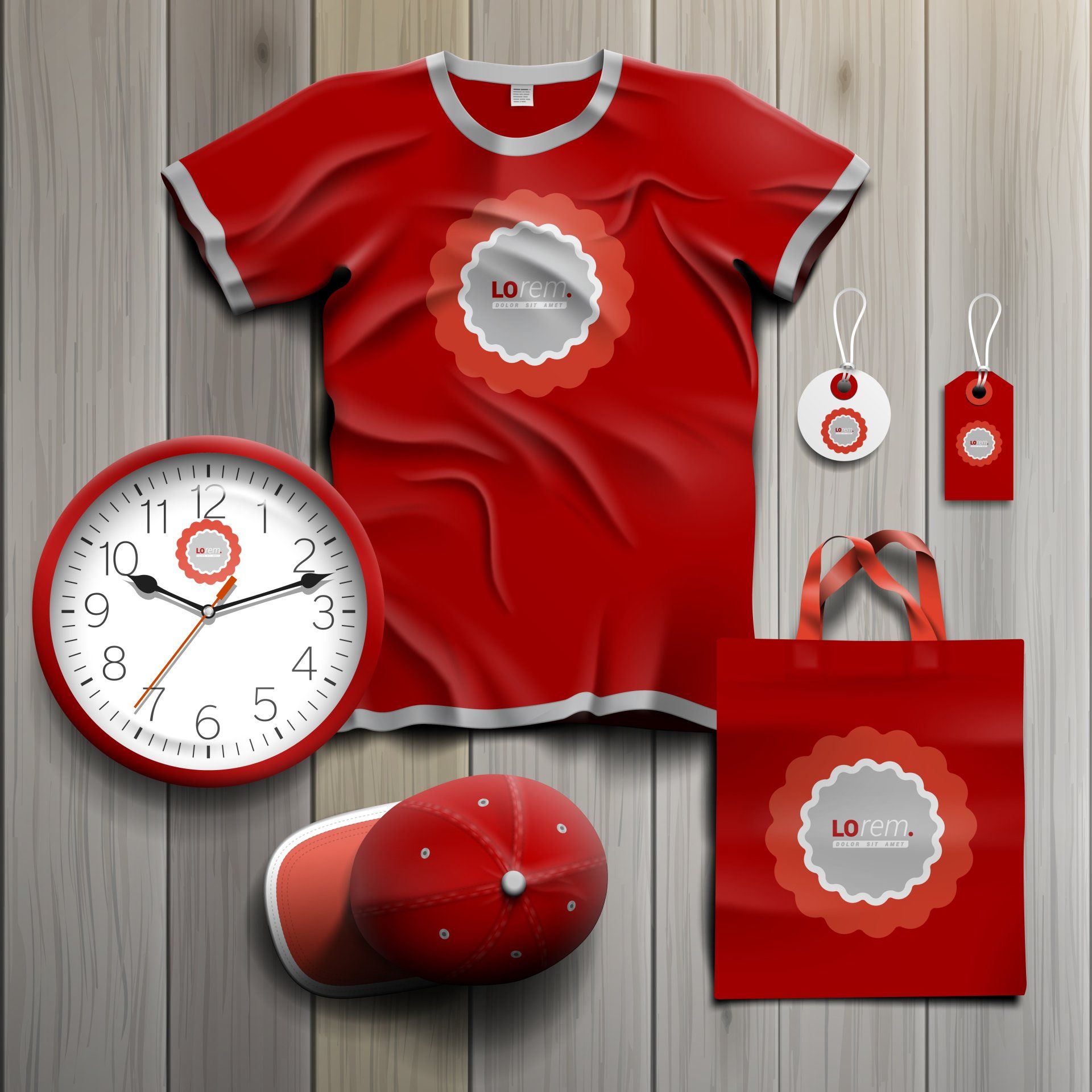 A red t-shirt a clock a hat and a bag are on a wooden table