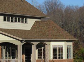 Man With Drill — Jasper, IN — Fleck Roofing