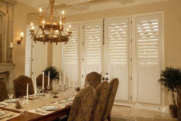 Plantation shutters in dining room  — Window Shades in Louisville, KY