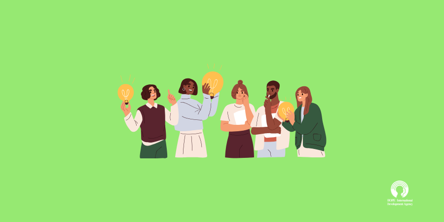 Diverse group of people holding light bulbs, symbolizing ideas, on a green background.