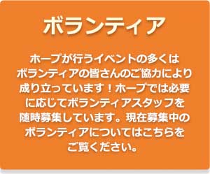 An orange sign with japanese writing on it