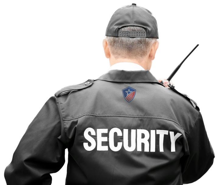 A security guard wearing a black jacket with the word security on the back