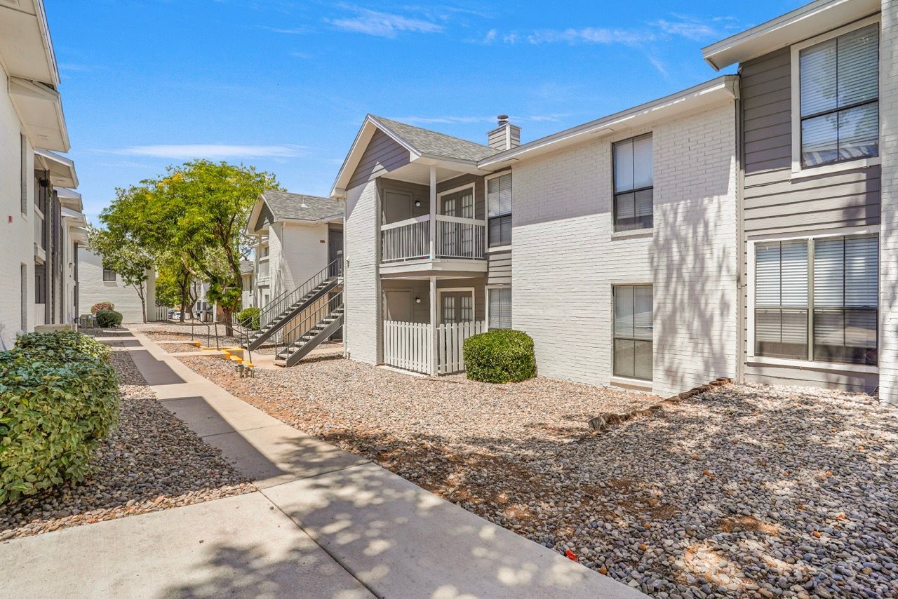 Telegraph Hill apartment building with stairways and gravel landscaping.