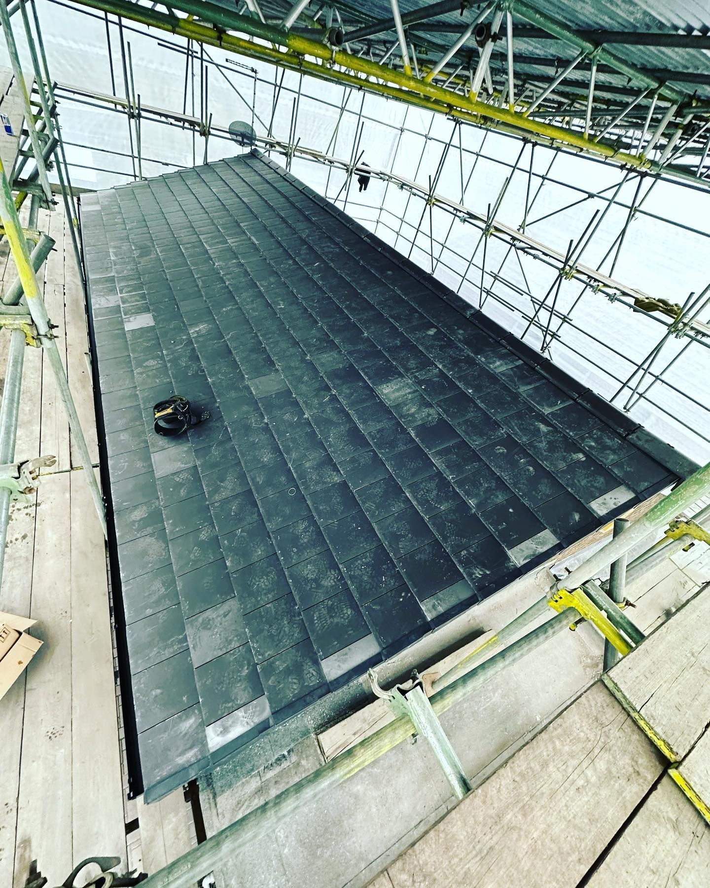 A picture of a slate roof replacement  carried out by Roofers Barnsley