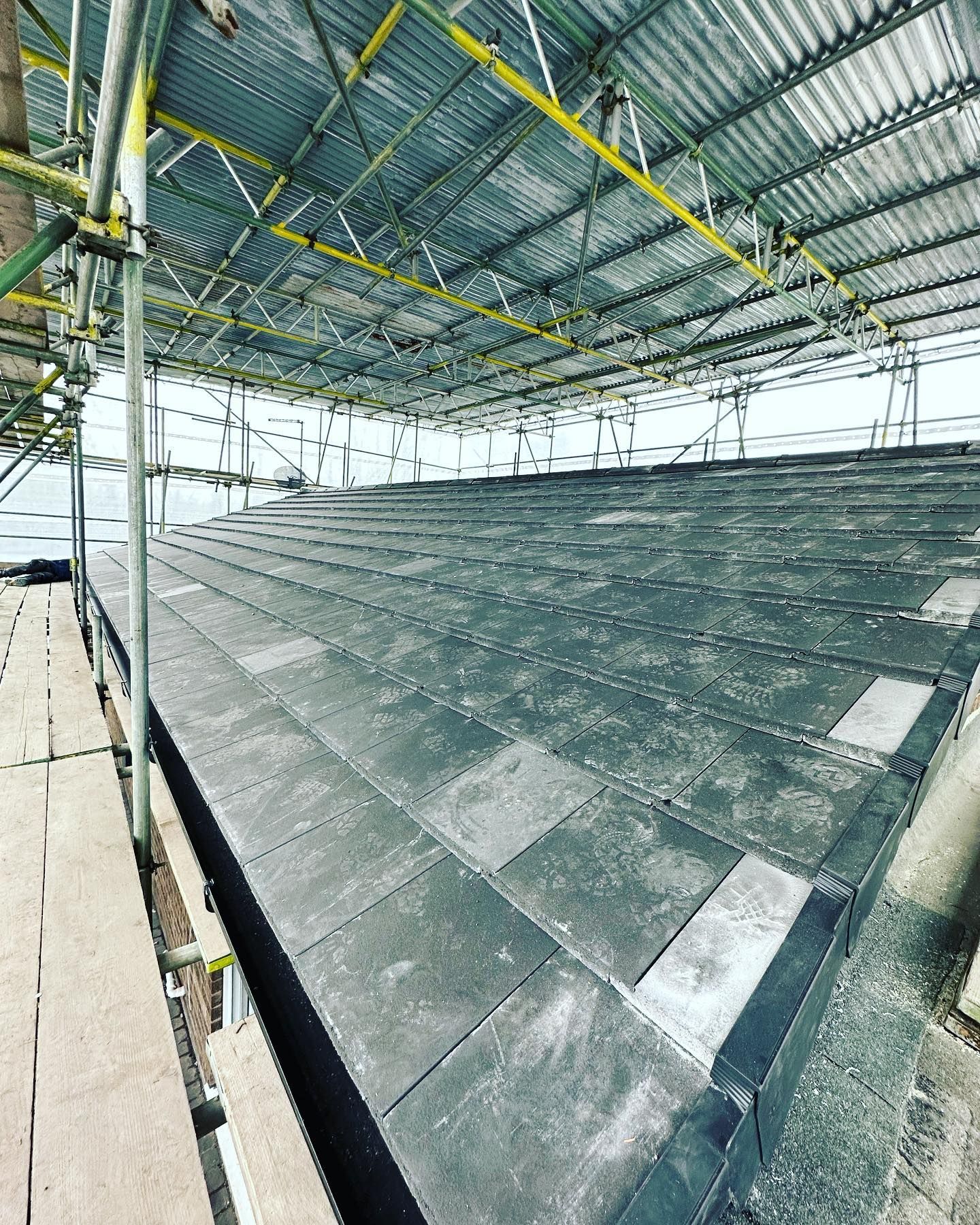 A picture of a slate roof replacement  carried out by Roofers Barnsley
