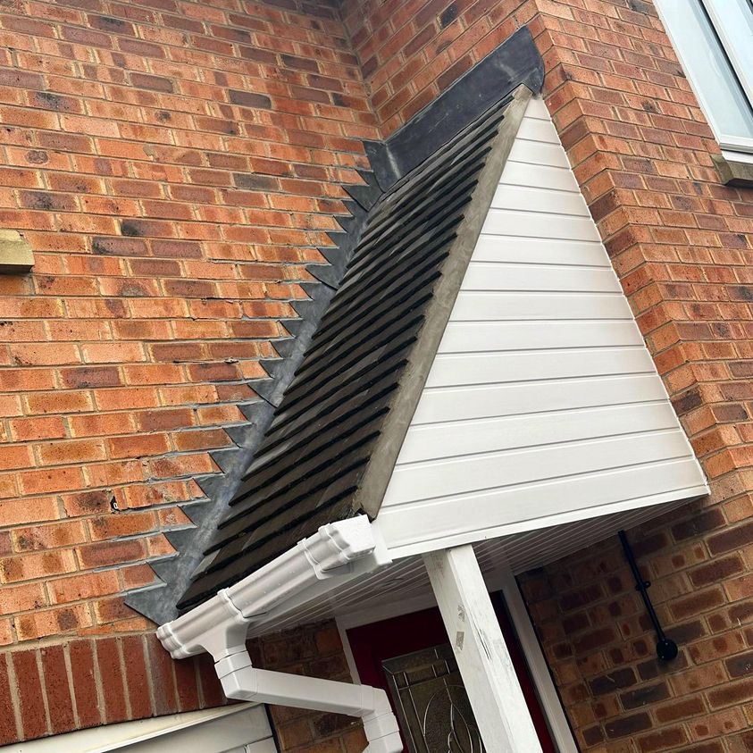 a picture of a porch roof replacement by roofers Barnsley