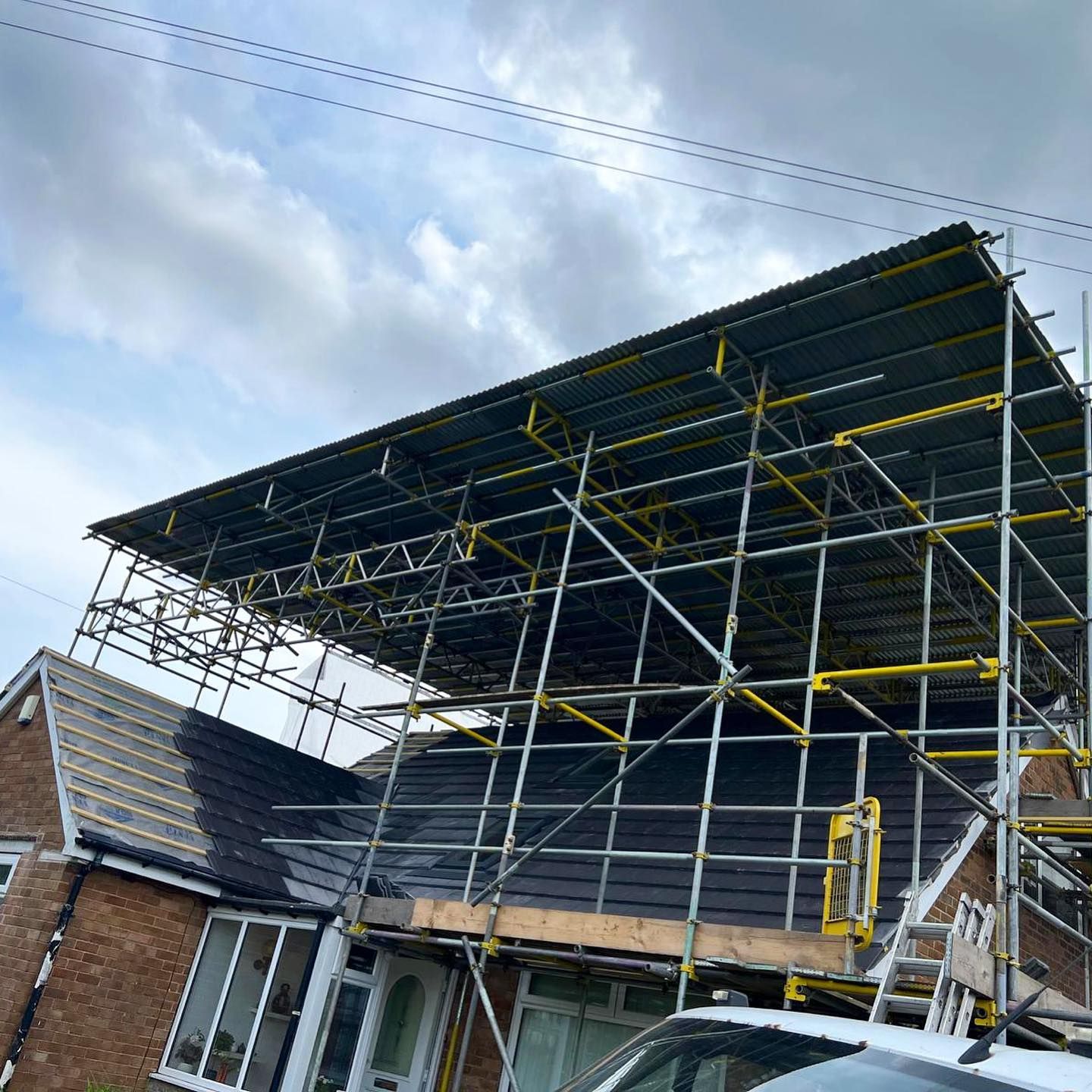 a picture of a roof with scaffolding