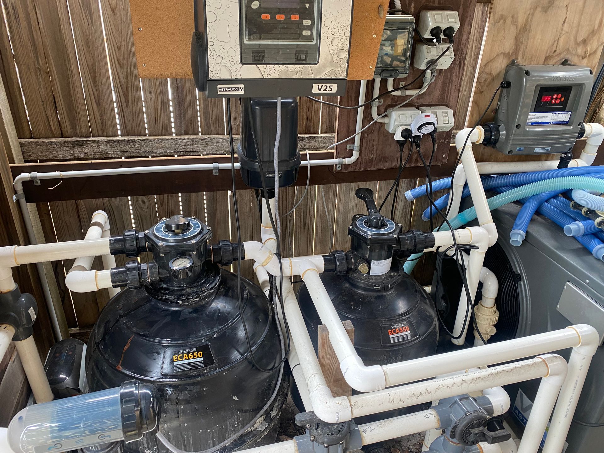 A Swimming Pool Filter is Sitting Inside of a Box With the Lid Open — Tweed Coast Pool Care in South Murwillumbah, NSW