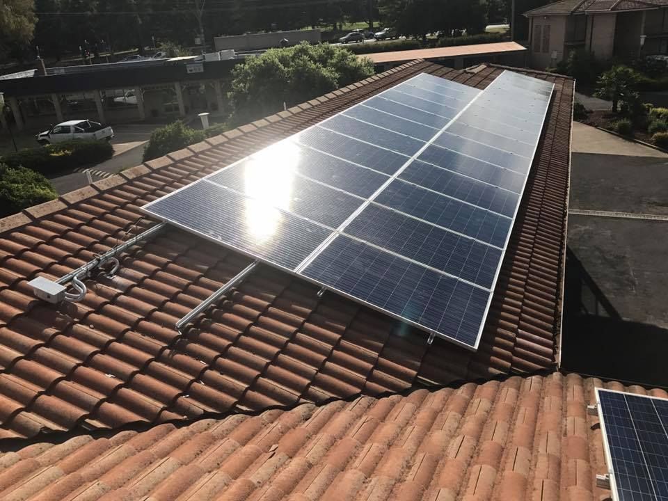 A Roof With A Lot Of Solar Panels On It — CJ Electrical & Solar In Wallsend, NSW