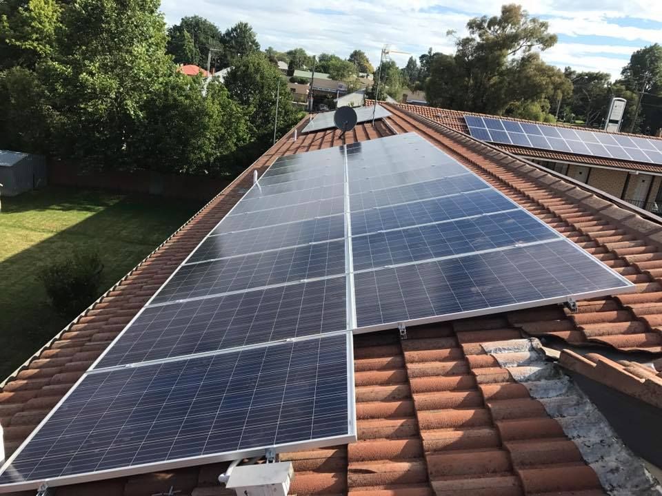 A Roof With A Lot Of Solar Panels On It — CJ Electrical & Solar In East Maitland, NSW