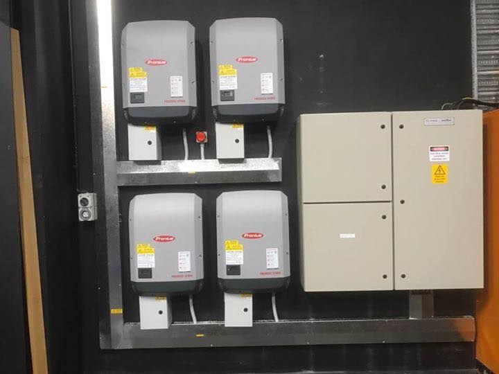A Wall With A Bunch Of Electrical Boxes On It — CJ Electrical & Solar In San Remo, NSW