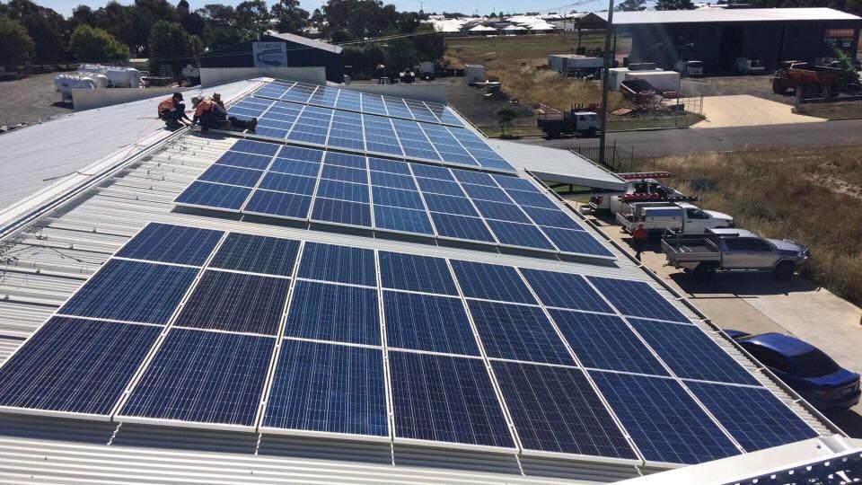 A Roof With A Lot Of Solar Panels On It — CJ Electrical & Solar In Kotara, NSW