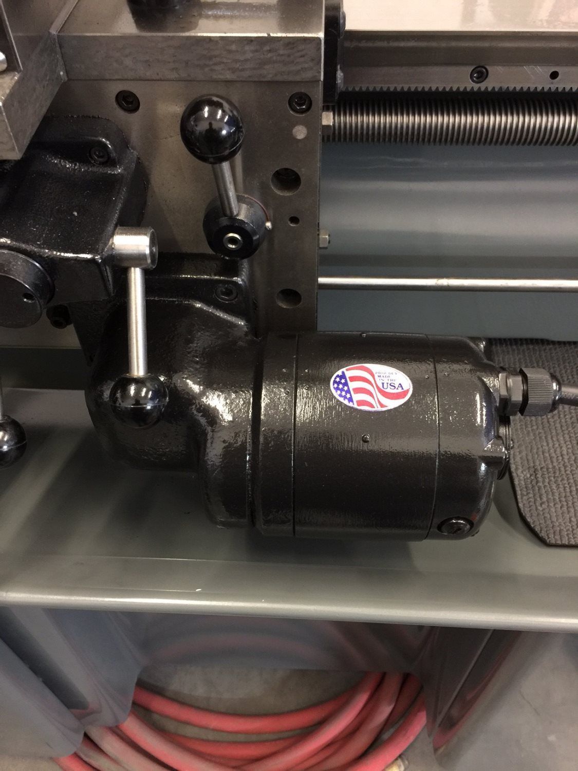 A lathe with an american flag sticker on it