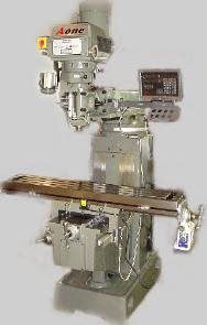 A machine is sitting on top of a table on a gray background.