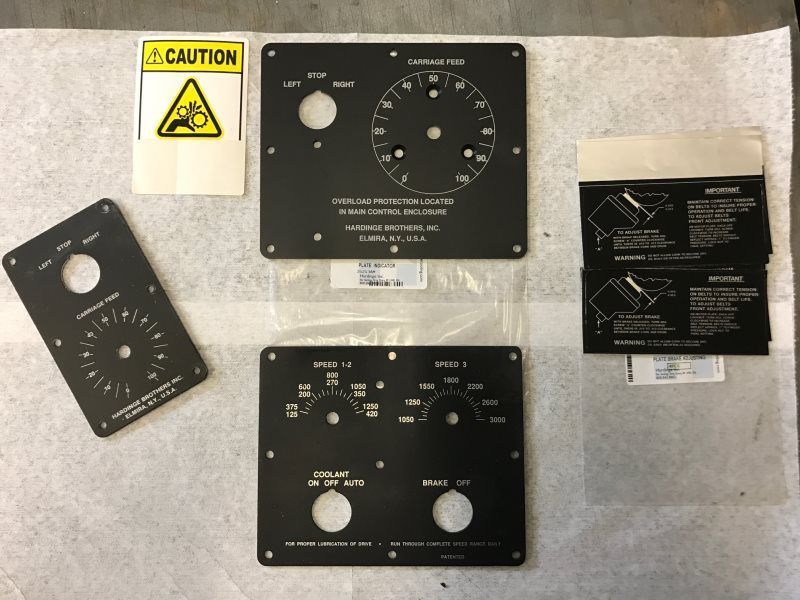 A caution sign is next to a bunch of signs