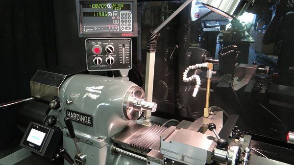 A lathe with a digital display on top of it.