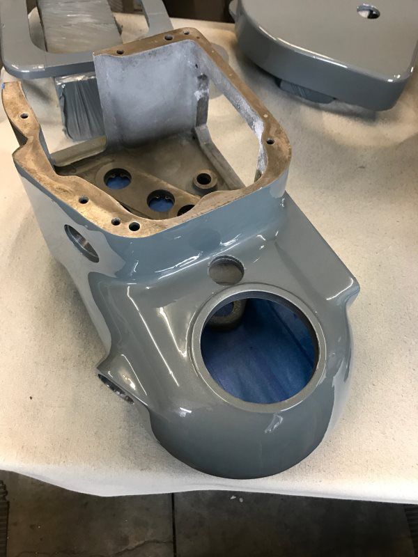 A piece of metal with a hole in the middle is sitting on a table.