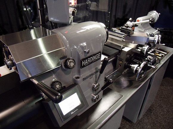 A hardinge lathe is sitting on a counter