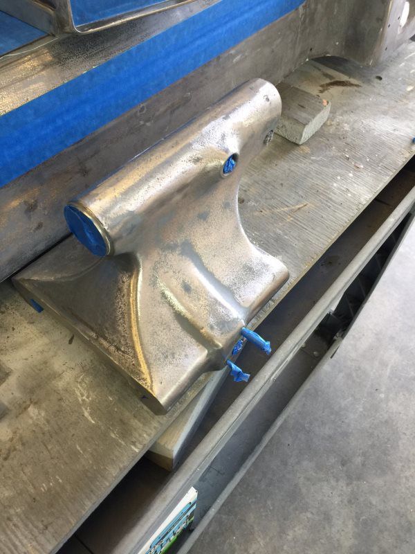 A piece of metal is sitting on top of a table.