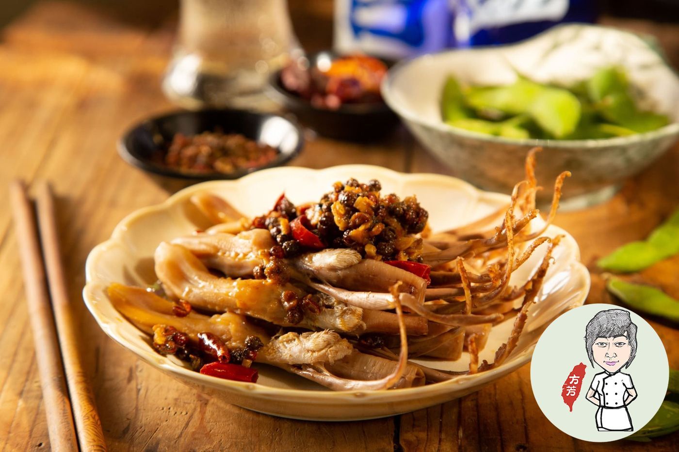 A plate of food with chopsticks on a wooden table.
