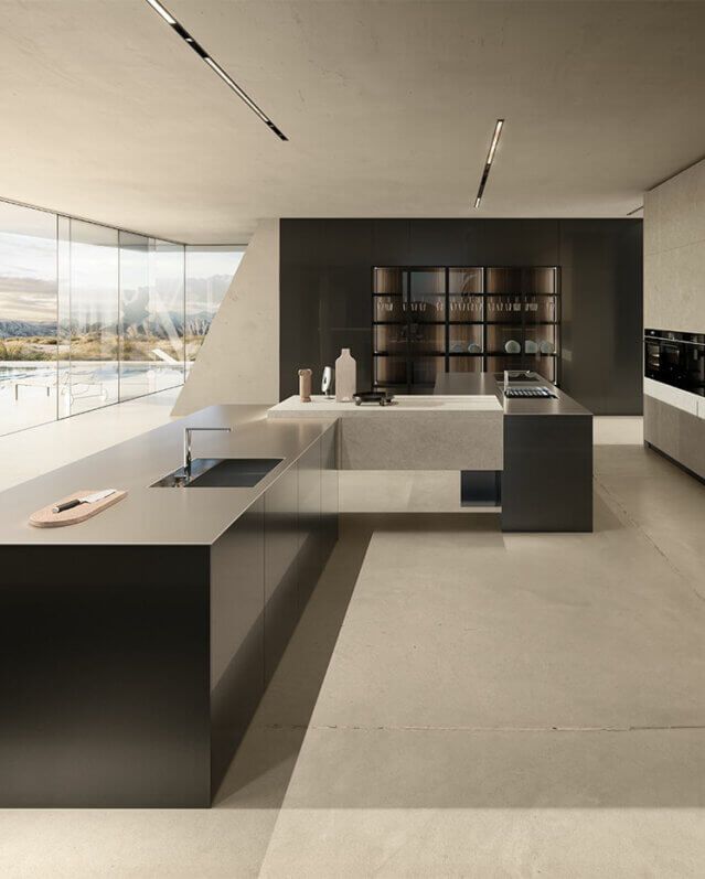 Una cucina moderna con una grande isola al centro della stanza.