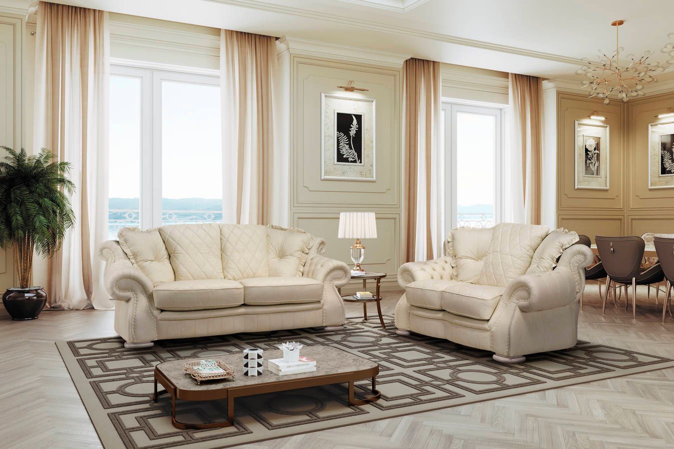 Un soggiorno con due divani bianchi, un tavolino da caffè e un tappeto.