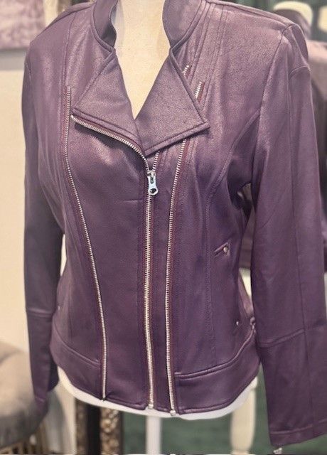 A purple leather jacket is on a mannequin.