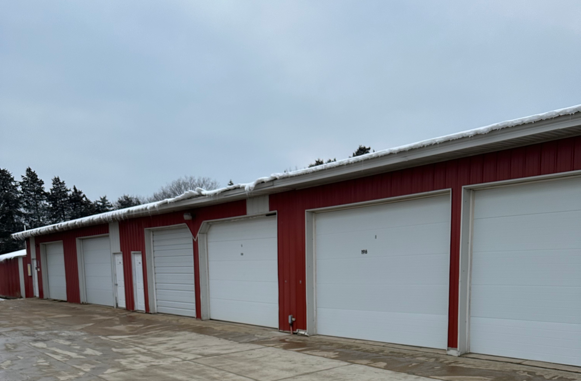 Man And Woman Holding Box — Madison, WI — Affordable Self Storage