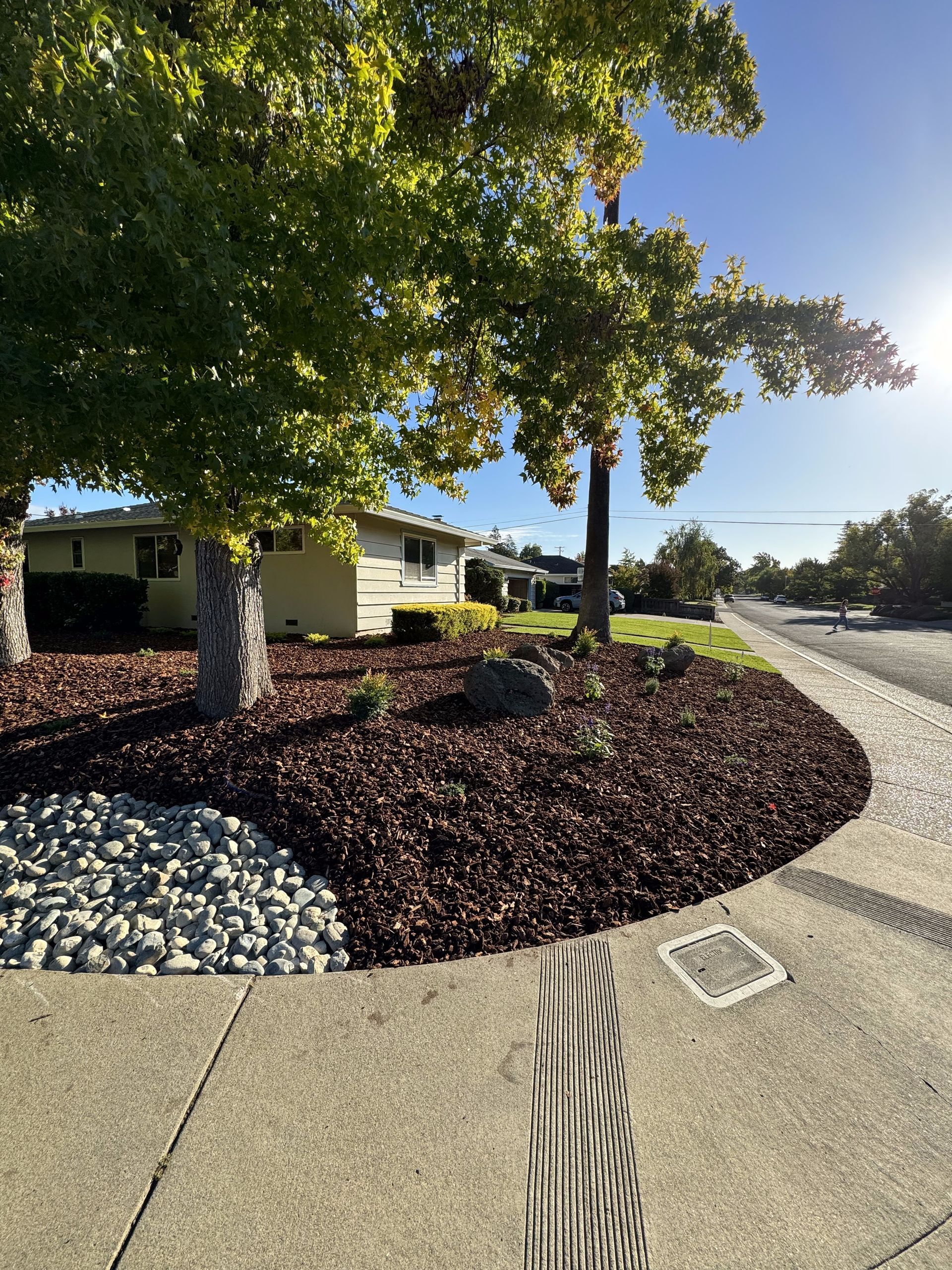 A house sits on the corner of a residential street