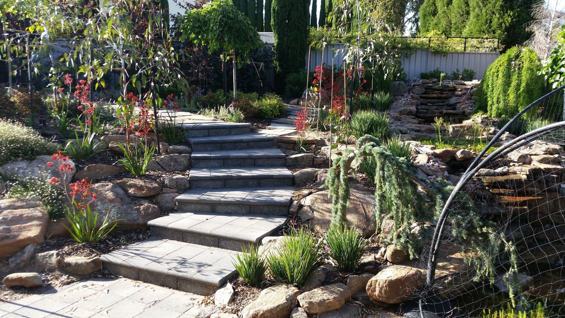 White Car on Driveway — Adelaide, SA — Playford Pavers