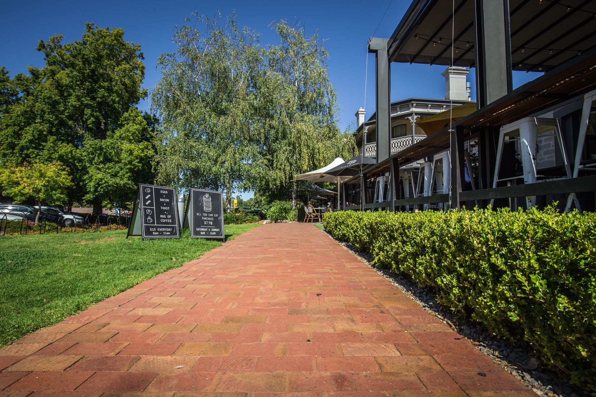 White Car on Driveway — Adelaide, SA — Playford Pavers