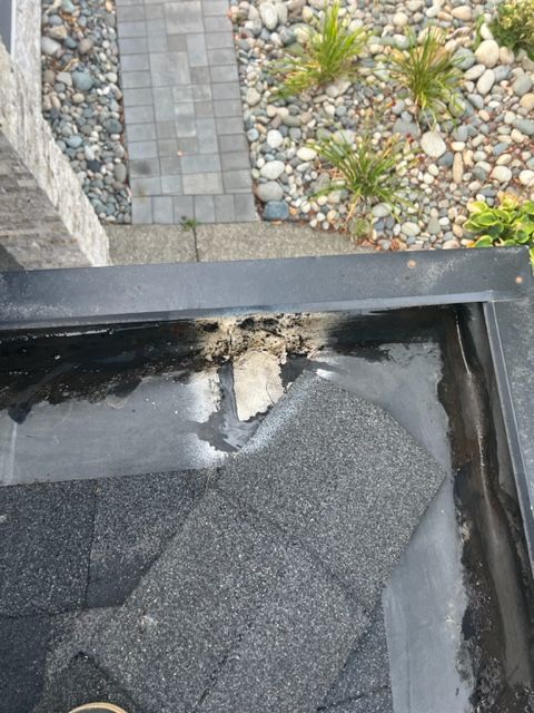 There is a hole in the roof of a building.